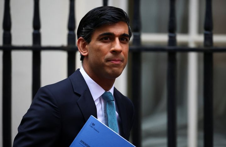 Chancellor Rishi Sunak leaves Downing Street to deliver his spending review to the Commons