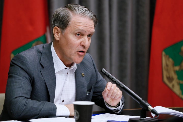 Manitoba Health, Seniors and Active Living Minister Cameron Friesen speaks during a COVID-19 press conference at the Manitoba legislature in Winnipeg on March 27, 2020.