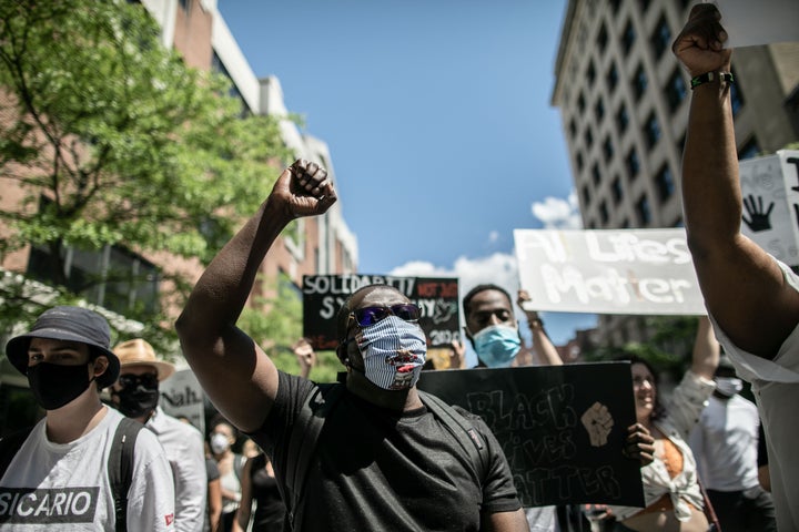 Protesters march against police brutality and racism in Montreal on June 7.