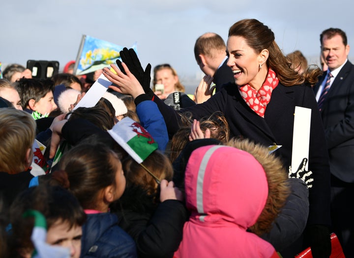 Kate Middleton high fives children as she leaves the RNLI Mumbles Lifeboat Station on February 04, 2020 near Swansea, South Wales. 