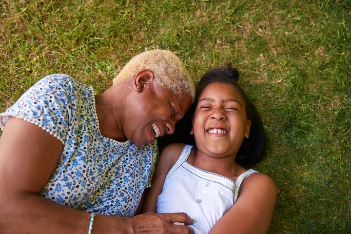 A stock image of a kinship carer and their child.