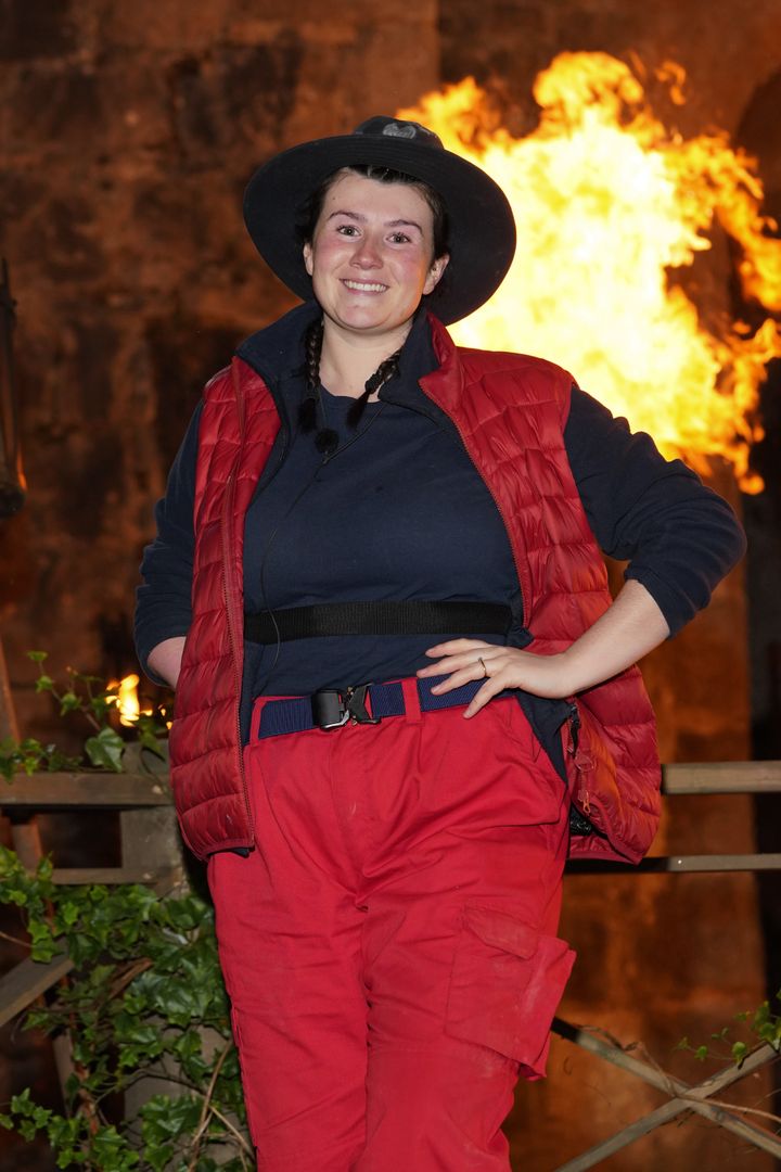 Hollie Arnold poses outside the I'm A Celebrity castle