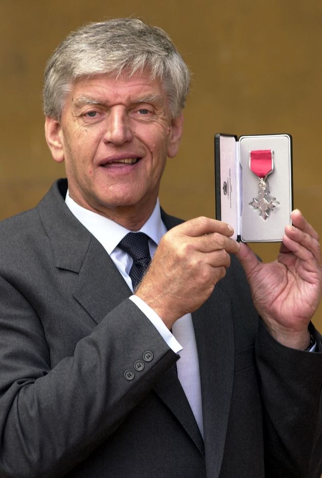 Dave Prowse received an MBE for services to charity and road safety from Queen Elizabeth II in 2000