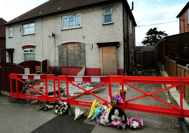 File photo dated 04/04/13 of tributes outside the house in Allenton, Derby.