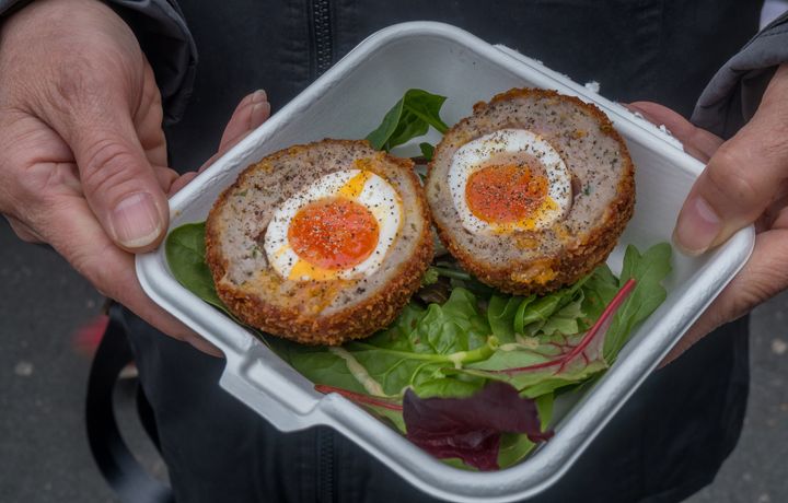 Breakfast of Scotch eggs and traditional vegetable salad (pork and soups) in the borough market.
