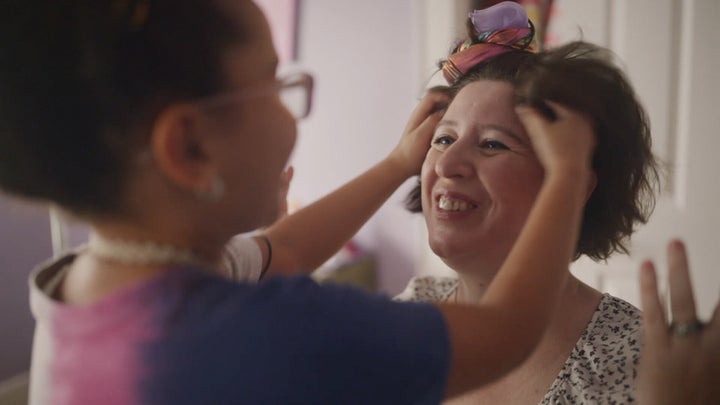 <strong>Eliza tries out her burgeoning hair styling skills on her mother. </strong><br>(Photograph: Courtesy of Pantene)