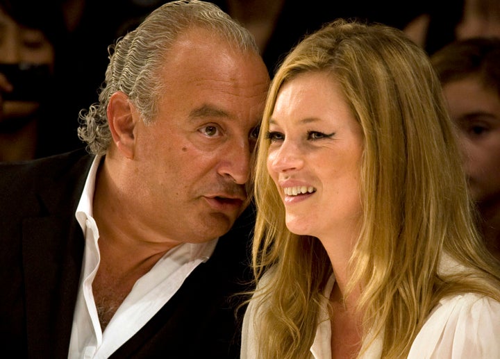 Kate Moss and Philip Green watch the Fashion for Relief charity fashion show in 2007.