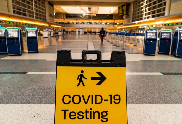 A COVID-19 testing sign at the empty Tom Bradley International Terminal at Los Angeles International Airport on Nov. 25, 2020.