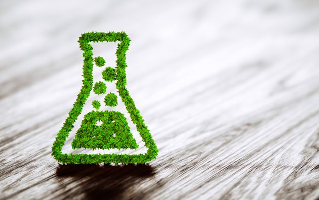 Green chemistry industry sign on black wooden background. 3D