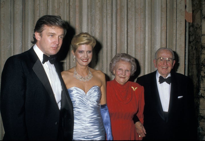 Donald Trump and then-wife Ivana Trump attend a 90th birthday party for Dr. Norman Vincent Peale (far right) at the Waldorf Astoria Hotel in New York on May 26, 1988.