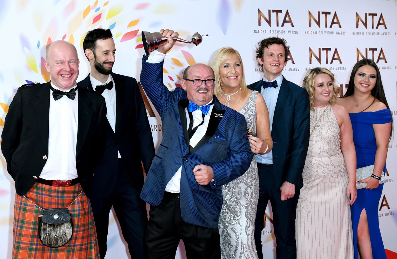 Brendan O'Carroll and Jennifer Gibney and cast of Mrs Brown's Boys with the award for best comedy at the National Television Awards 2020