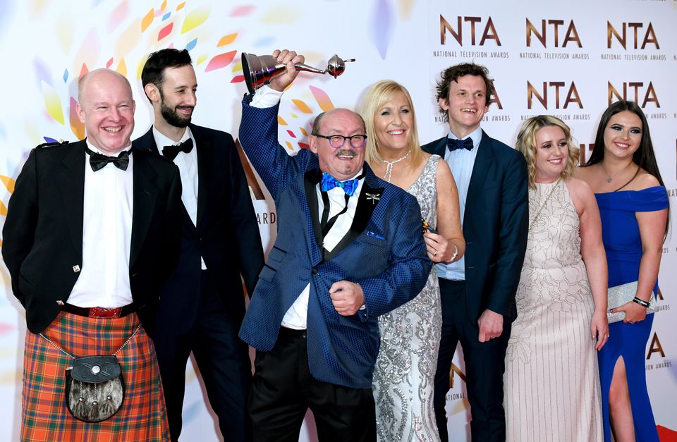 Brendan O'Carroll and Jennifer Gibney and cast of Mrs Brown's Boys with the award for best comedy at the National Television Awards 2020.