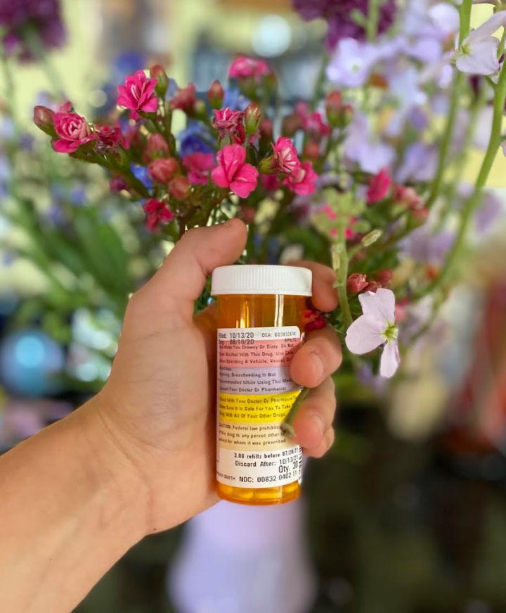 The author holding her Prozac prescription, which she started taking during the peak of the pandemic and continues to take to this day. 