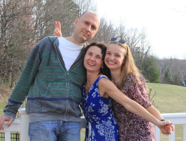 The author (right) with her parents in early March, on her mother's birthday.