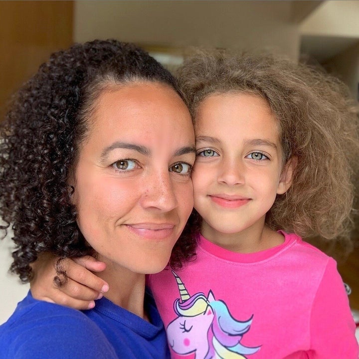 Letting my hair down with my youngest daughter who shares the same head of curls.