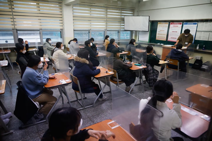 South Korea is pressing ahead with nationwide standardized tests despite rising coronavirus cases.