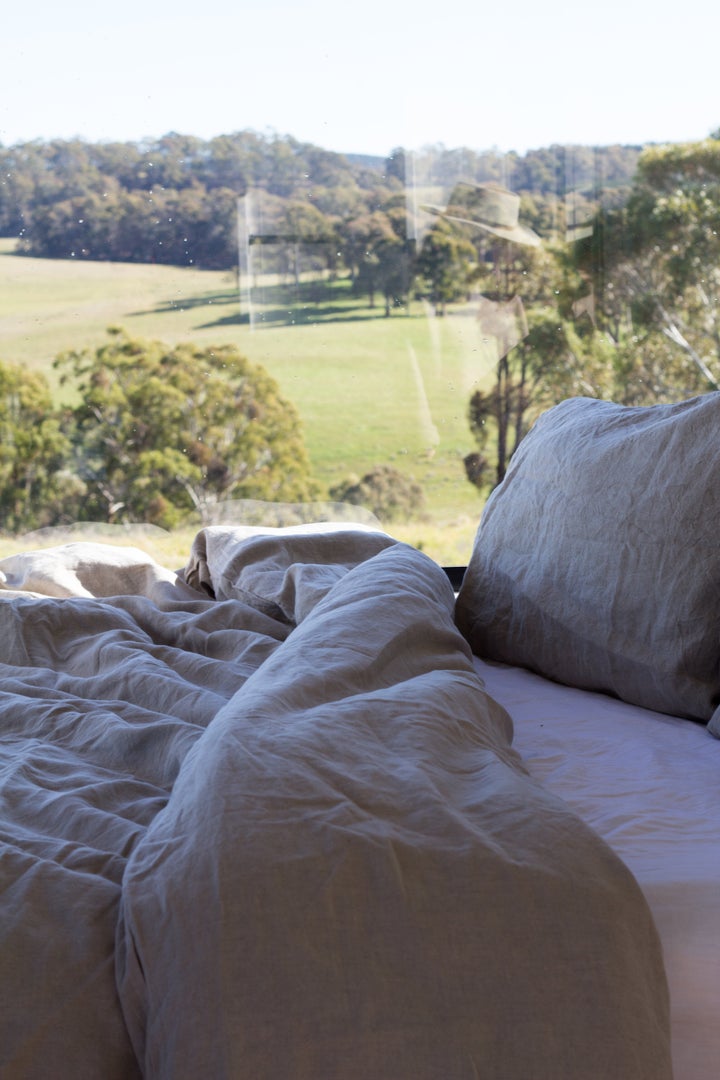 Curl up in Carlotta + Gee linens and enjoy the view from The Daisy House in the Blue Mountains. 