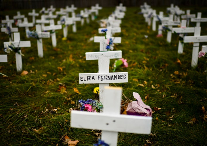 Crosses are displayed in memory of residents who died of COVID-19 at Camilla Care Community long-term care home in Mississauga, Ont., on Nov. 19, 2020. 