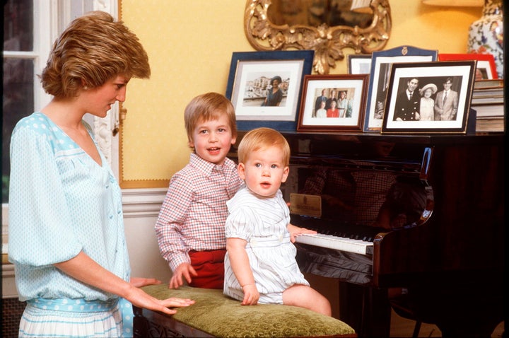 Diana gazes adoringly at her little ones. 