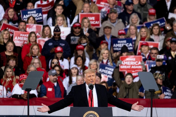 President Donald Trump addresses the crowd at a rally for U.S. Senators Kelly Loeffler, R-Ga., and David Perdue, R-Ga., who a