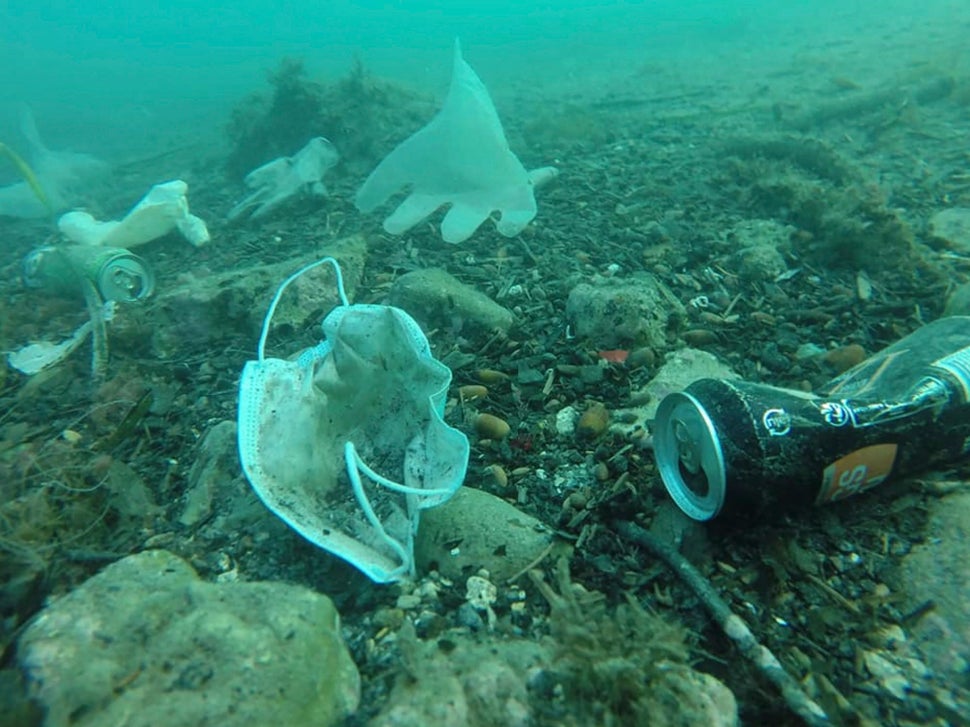 Plastic gloves, face masks and other waste in the Mediterranean Sea off the coast of southern France on May 21, 2020.
