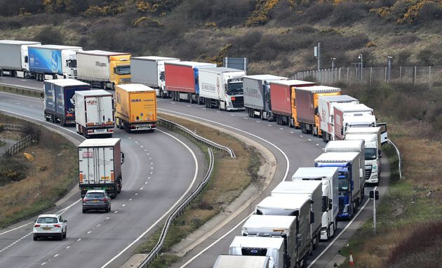 Lorries queue on the A20 to enter the Port of Dover in Kent.