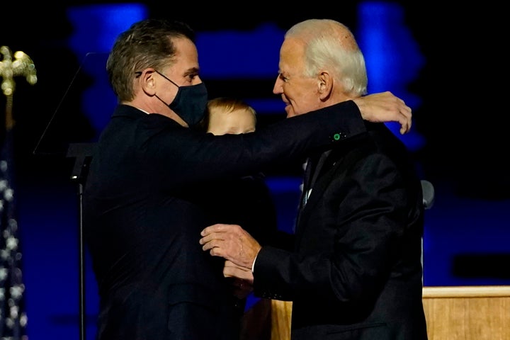 Hunter Biden, seen here with his father President-elect Joe Biden, is under investigation by the Justice Department, the tran