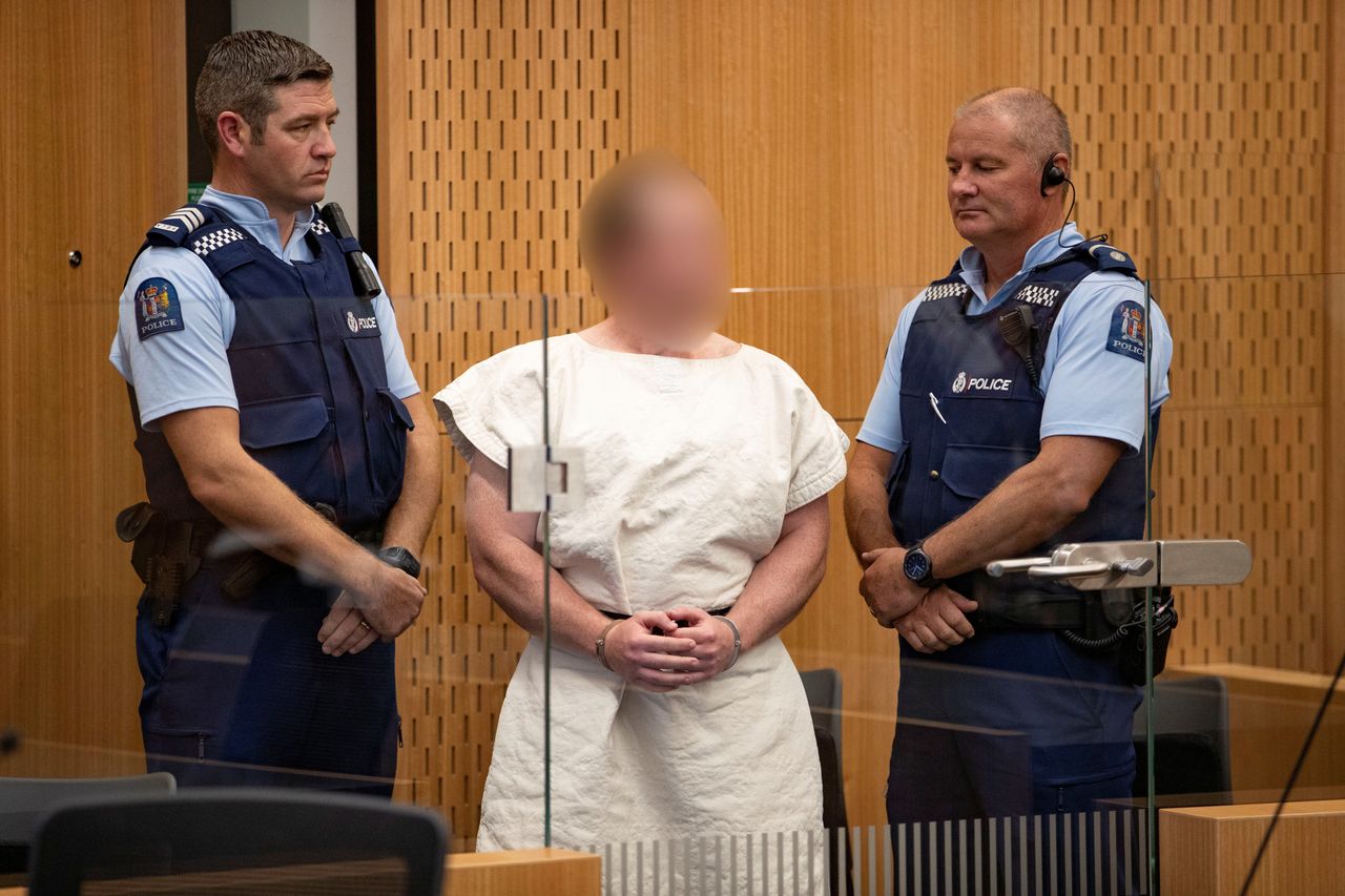 Brenton Tarrant, whose face is obscured here, is seen in the dock during his appearance in the Christchurch District Court, New Zealand March 16, 2019.