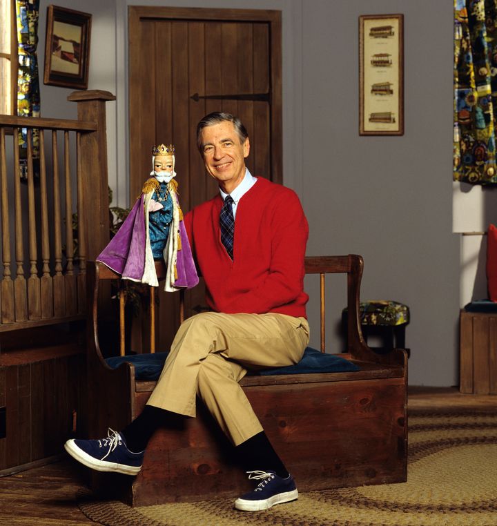 Mister Rogers sits on set with King Friday.