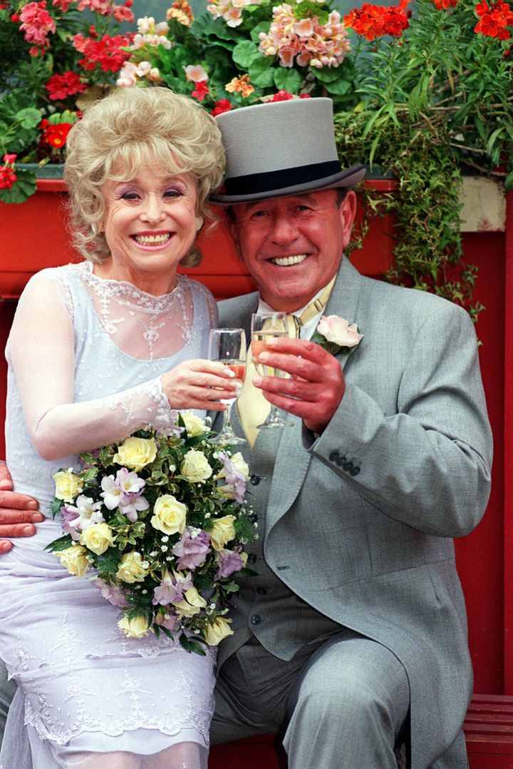 Barbara Windsor as Peggy Mitchell and Mike Reid, who played Frank Butcher, in EastEnders in 1999.