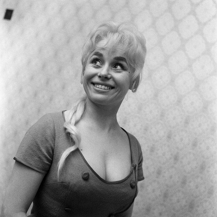 Cockney actress Barbara Windsor at home, 12th February 1960. (Photo by Barham/Daily Herald/Mirrorpix/Getty Images)