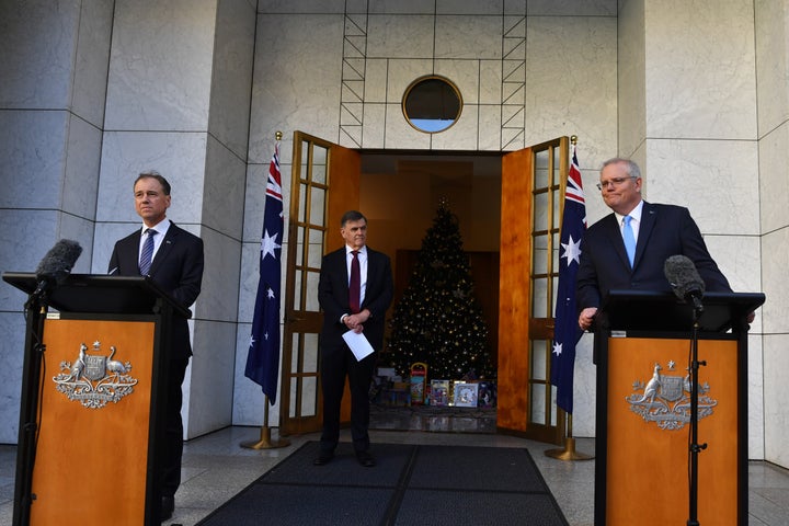 Australia's Minister for Health Greg Hunt (left), Prime Minister Scott Morrison (right) and Australia's Chief Medical Officer Brendan Murphy (centre) during a press conference in the Prime Ministers courtyard on December 11, 2020 in Canberra, Australia. Clinical trials of a COVID-19 vaccine being developed by the University of Queensland in partnership with biotech company CSL will be abandoned, after the Federal Government had committed to purchasing, and agreements had been made to secure 51 million doses of the vaccine.