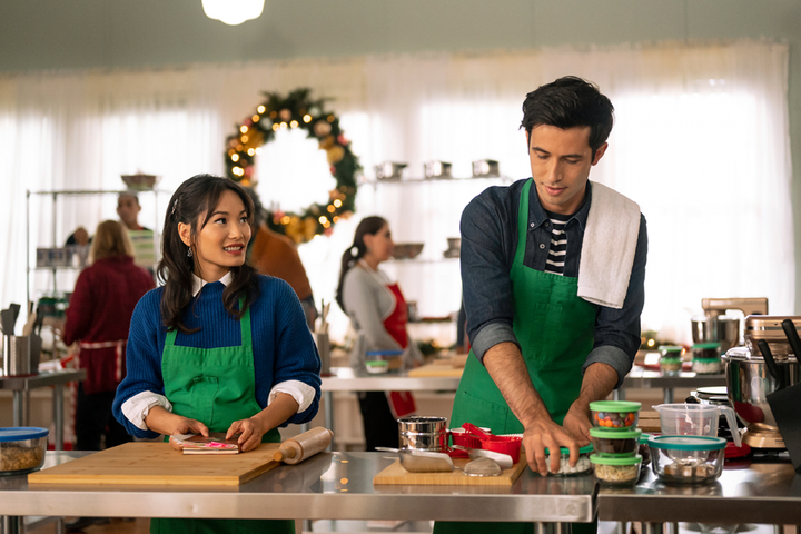 Jacky Lai (left) and Tony Giroux (right) in a scene from Lifetime's "A Sugar & Spice Holiday," the network's first holiday rom-com featuring a Chinese American family.