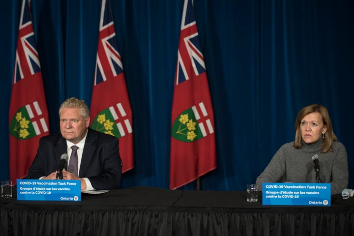 Ontario Premier Doug Ford listens during a press conference at Queen's Park in Toronto on Dec. 11, 2020.