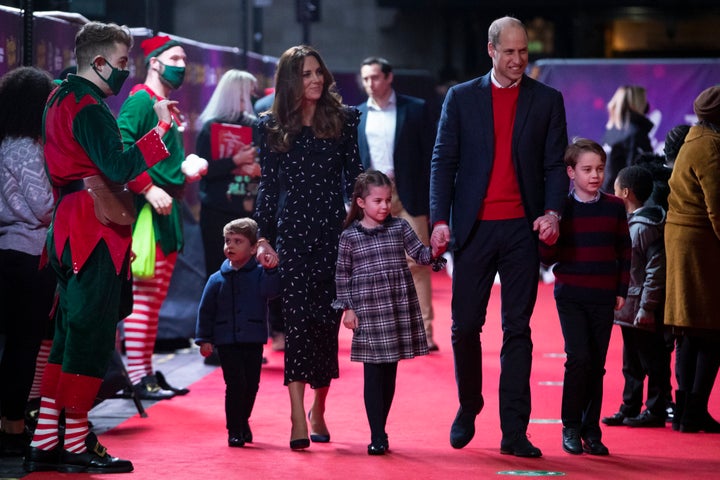 Prince William and Kate Middleton with their children Prince Louis, Princess Charlotte and Prince George at a pantomime performance at London's Palladium Theatre on Friday.