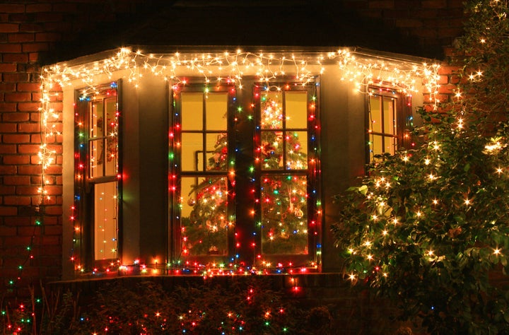 A Christmas tree in a window