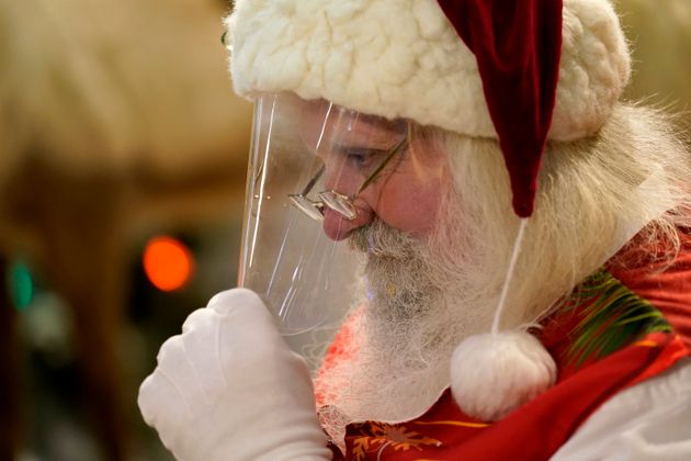 Le père Noël en visite aux enfants dans un centre commercial de Miami, le 20 novembre