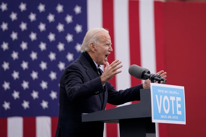 President-elect Joe Biden speaks during a drive-in rally for U.S. Senate candidates Jon Ossoff and Rev. Raphael Warnock in Atlanta.