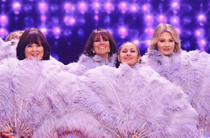 The ladies used giant feather fans as part of their performance