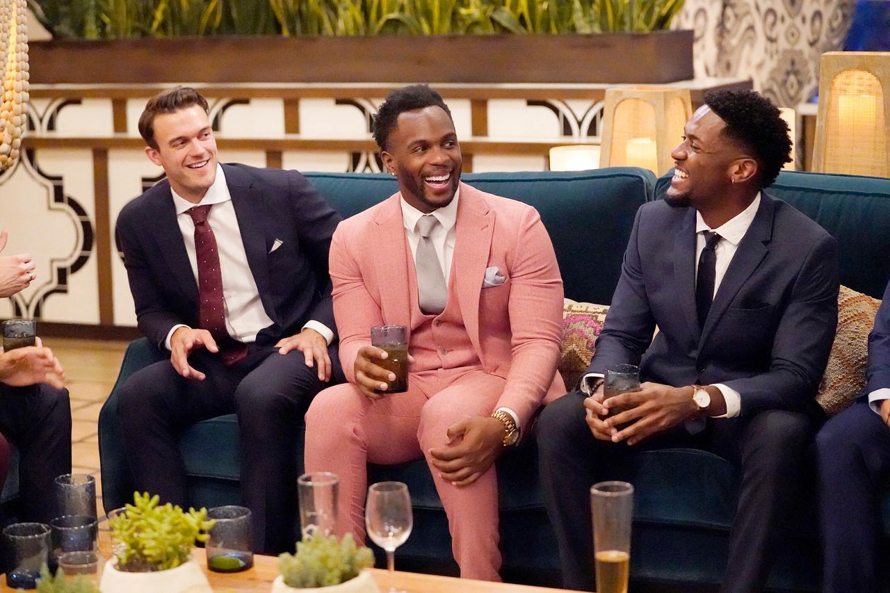 Nwachukwu (center) with castmates Ben Smith (left) and Demar Jackson (right) on this season of "The Bachelorette."