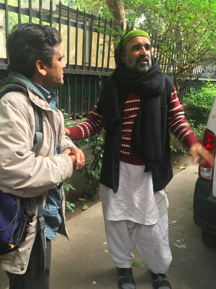 Muslim peace activist Faisal Khan (right) speaks with Hindus for Human Rights co-founder Deepak Gupta in Delhi, India, in December 2019.