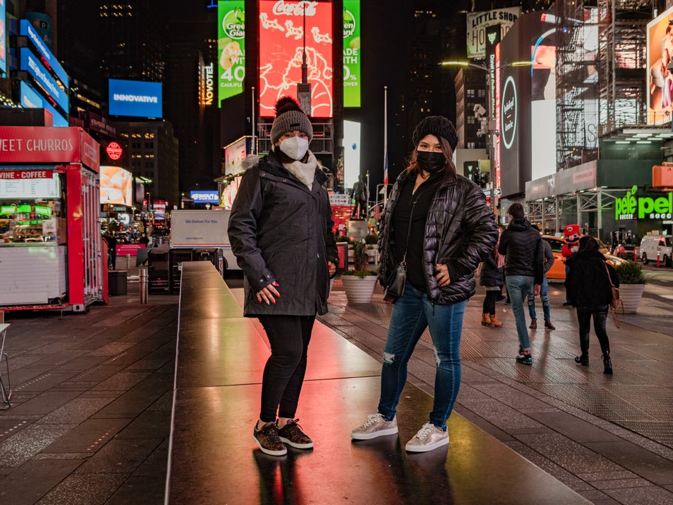 Daisy Martinez and Cindy Herrera are seen here on their first night in New York, shortly after arriving and checking into their hotel on Times Square. They decided to travel at this time to take advantage of empty streets. “We are afraid of coronavirus, but we’re taking maximum precautions with masks, sanitizing, washing hands, and that’s about all we can do.”