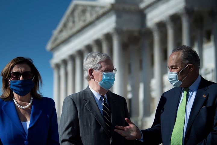 House Speaker Nancy Pelosi (D-Calif., from left) and Senate Majority Leader Mitch McConnell (R-Ky.) hashed out a deal to give Americans some financial relief during the pandemic.