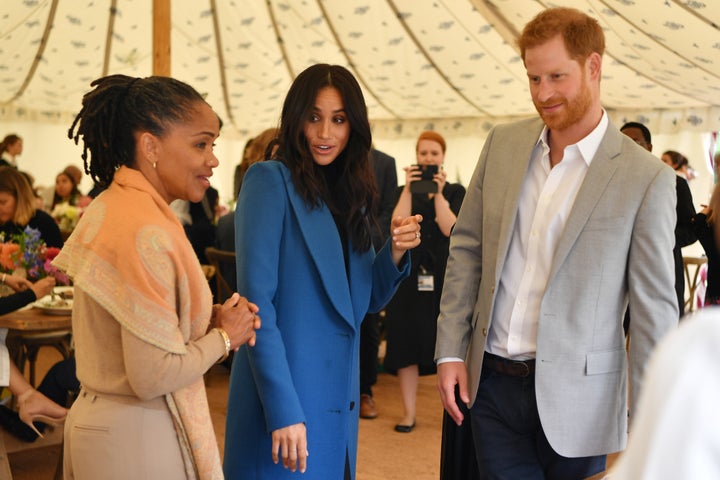 Meghan, Duchess of Sussex; her mother, Doria Ragland; and Prince Harry at the launch of a charity cookbook, at Kensington Palace in London, September 20, 2018.