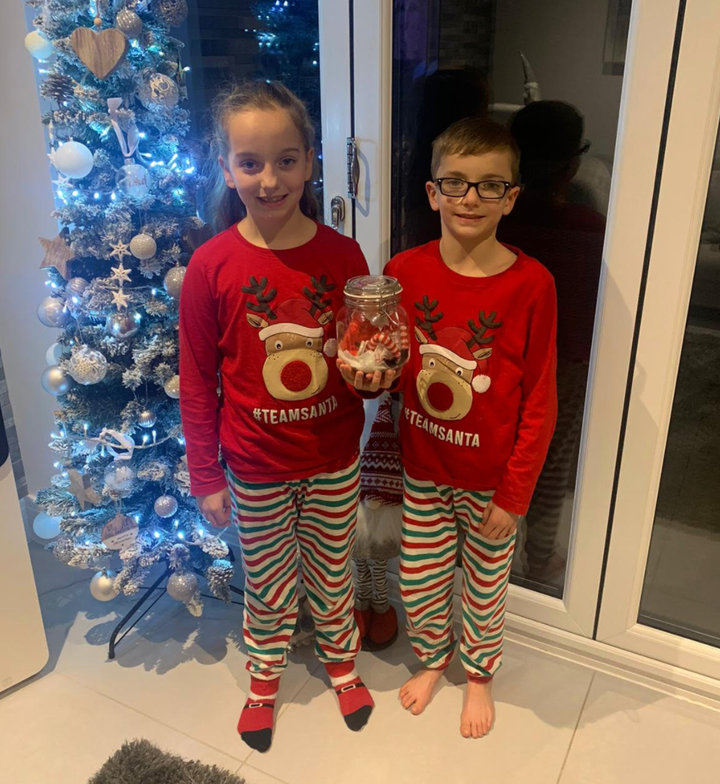 Alyssa and Harvey Ridsdale with their quarantined Elf On The Shelf