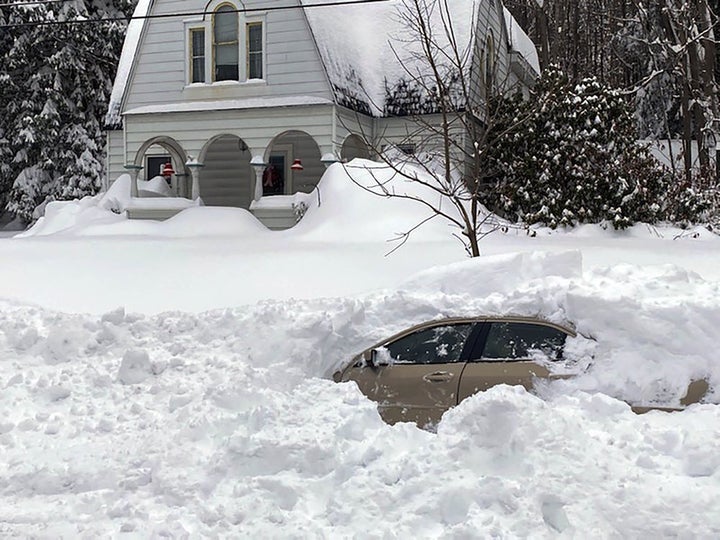 This photo, provided by the New York State Police, shows a car, in Owego, NY, from which a New York State Police sergeant rescued Kevin Kresen, 58.