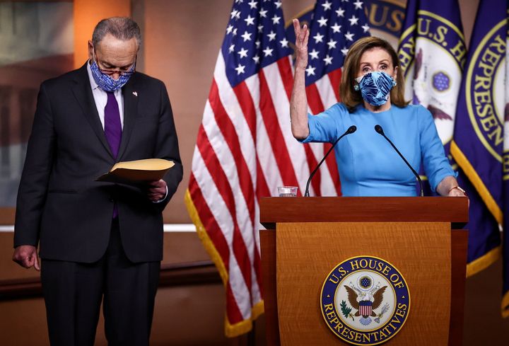 House Speaker Nancy Pelosi (D-Calif.) and Senate Minority Leader Chuck Schumer (D-N.Y.) speak to reporters at the Capitol on Nov. 12,.