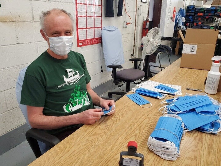 A CORCAN worker assembles face masks in a photo dated April 30, 2020.