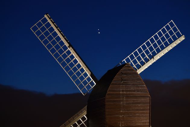 Jupiter and Saturn seen through windmills in the Brill region, England.  It's just before it gets closer.  In 800 years