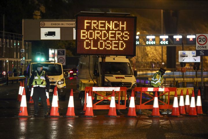 Police and port staff turn away vehicles from the Port of Dover in Kent.